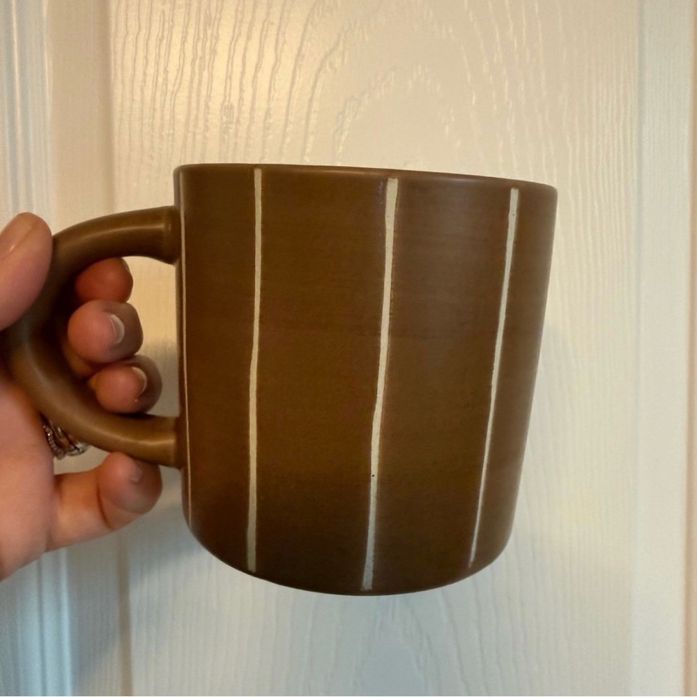 Elegant Brown Mug with White Accents